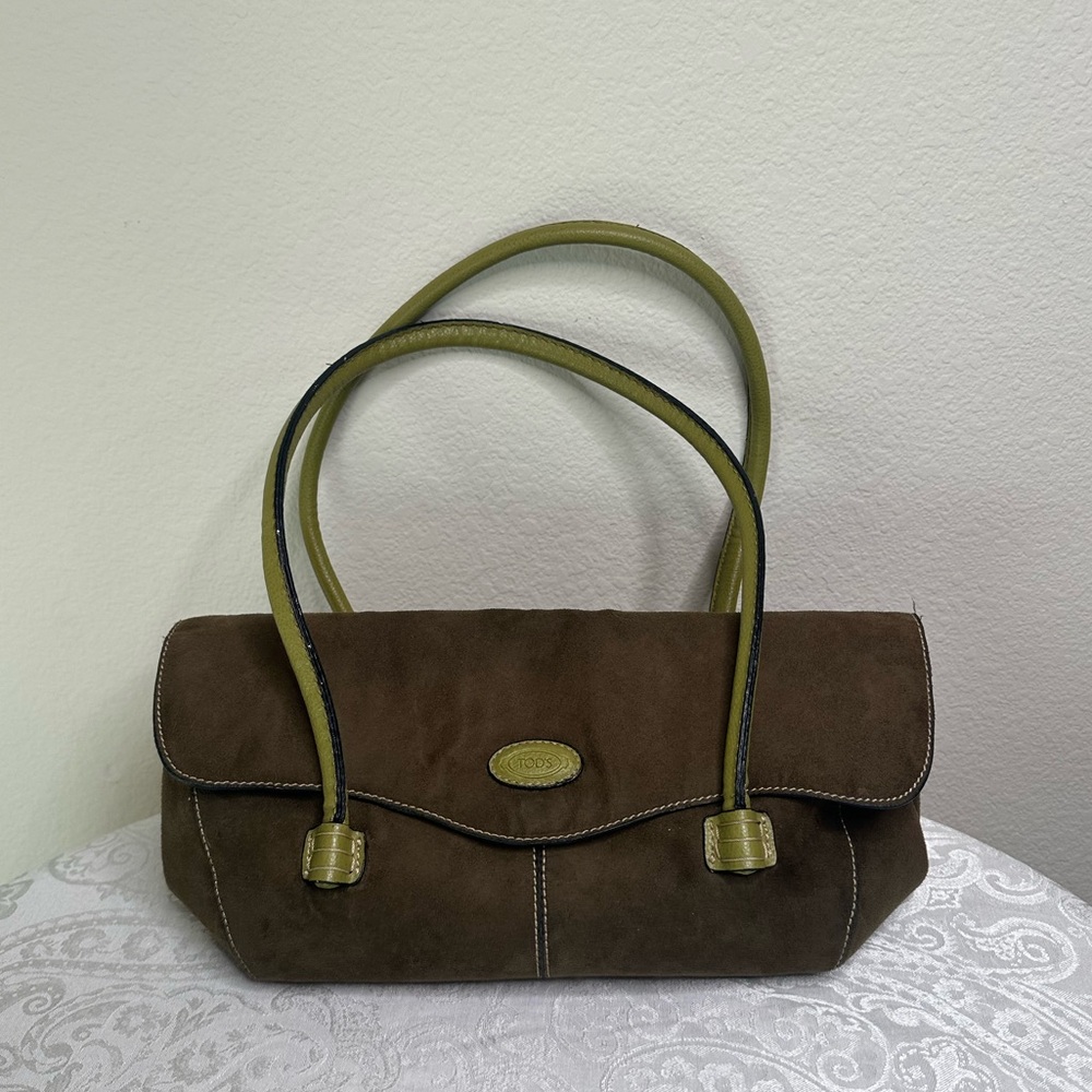 Tod’s green suede shoulder bag